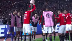 Egyptian football team celebrating in rain