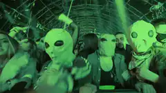 Alien masks at a green light concert
