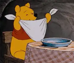 Winnie the Pooh tying a napkin
