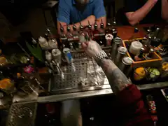 bartender pouring drinks