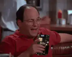 George Costanza holding a Bitane device