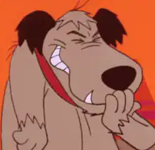 Dog biting his own paw