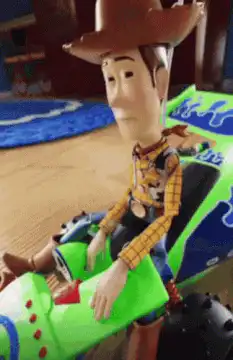 Woody and Rex on a toy car