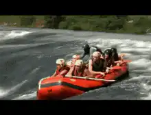 Raft flips in whitewater rapids