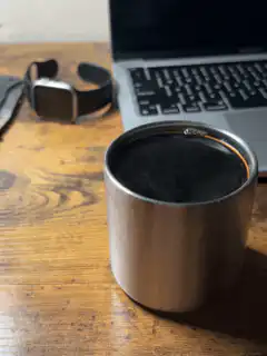 steam rising from coffee cup