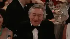 Robert De Niro laughing at an awards show