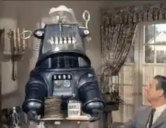 Robot serving pancakes and maple syrup