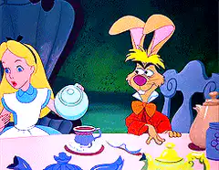 White Rabbit pours tea into Alice's cup