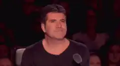 Simon Cowell laser eyes