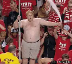 shirtless fan pees in crowd