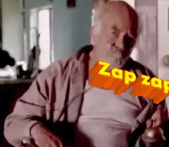 Old man sitting with zap zap text