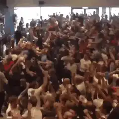 crowd jumping in gym