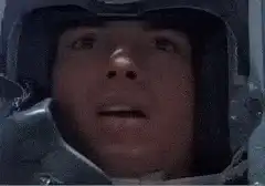 Man in helmet screaming