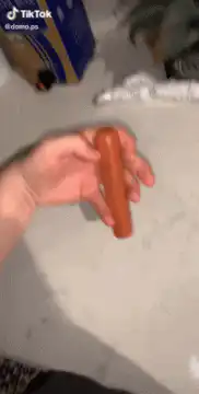 Hand spinning a hot dog
