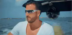 Man on boat shouting EGAL