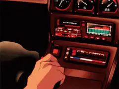 Hand pressing red button in car