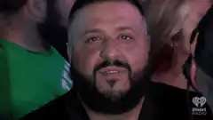 DJ Khaled nodding in crowd