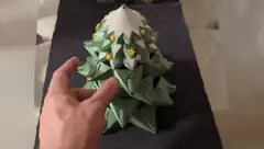 Hand opening origami advent calendar