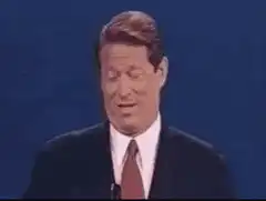 Al Gore nodding and smiling
