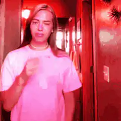 Woman dancing in pink shirt