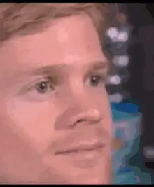Jesse Plemons blinking and smiling