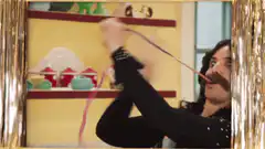 Man twirling colorful ribbons