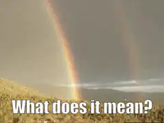 Rainbow over hills with text