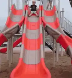 Toddler slides down and scratches head