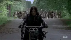 Daryl Dixon rides away from walkers