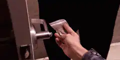 Handing a bag of weed through a door
