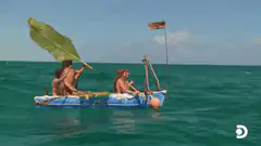 Survivor castaways on a raft