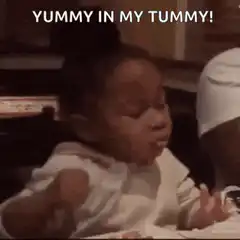 Baby enjoying food yummy in my tummy