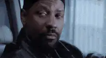 Denzel Washington side eye then smile