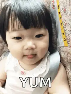 Baby saying yum