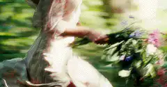 Woman swinging bouquet of flowers