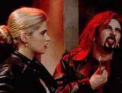 Tommy Wiseau screaming at a woman