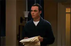 Sheldon throws papers in the air