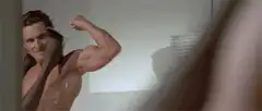 Matthew McConaughey flexing shirt
