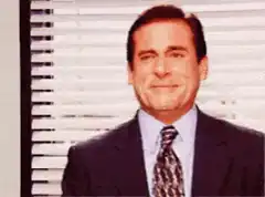 Michael Scott nodding and waving