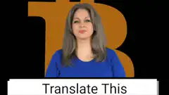 Woman gestures in front of Bitcoin logo