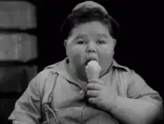 Child eating ice cream cone