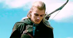 Legolas looking down with a bow