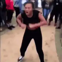 Man dancing energetically in public