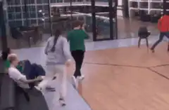 group of friends dancing indoors
