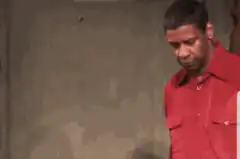 Denzel Washington and George Clooney shaking hands