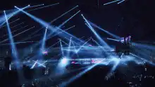blue laser beams at concert