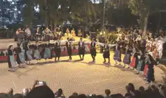 Traditional folk dancers in a circle