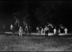 The Exorcist crowd walking at night