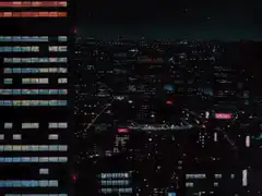 Night cityscape with scrolling film strip