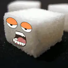 Sugar cube with cartoon face